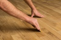 Why Does Parquet Or Laminate Flooring Lift, And How To Fix It